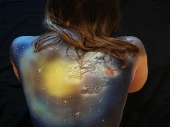 Tarot and astrological sign in bodypaint